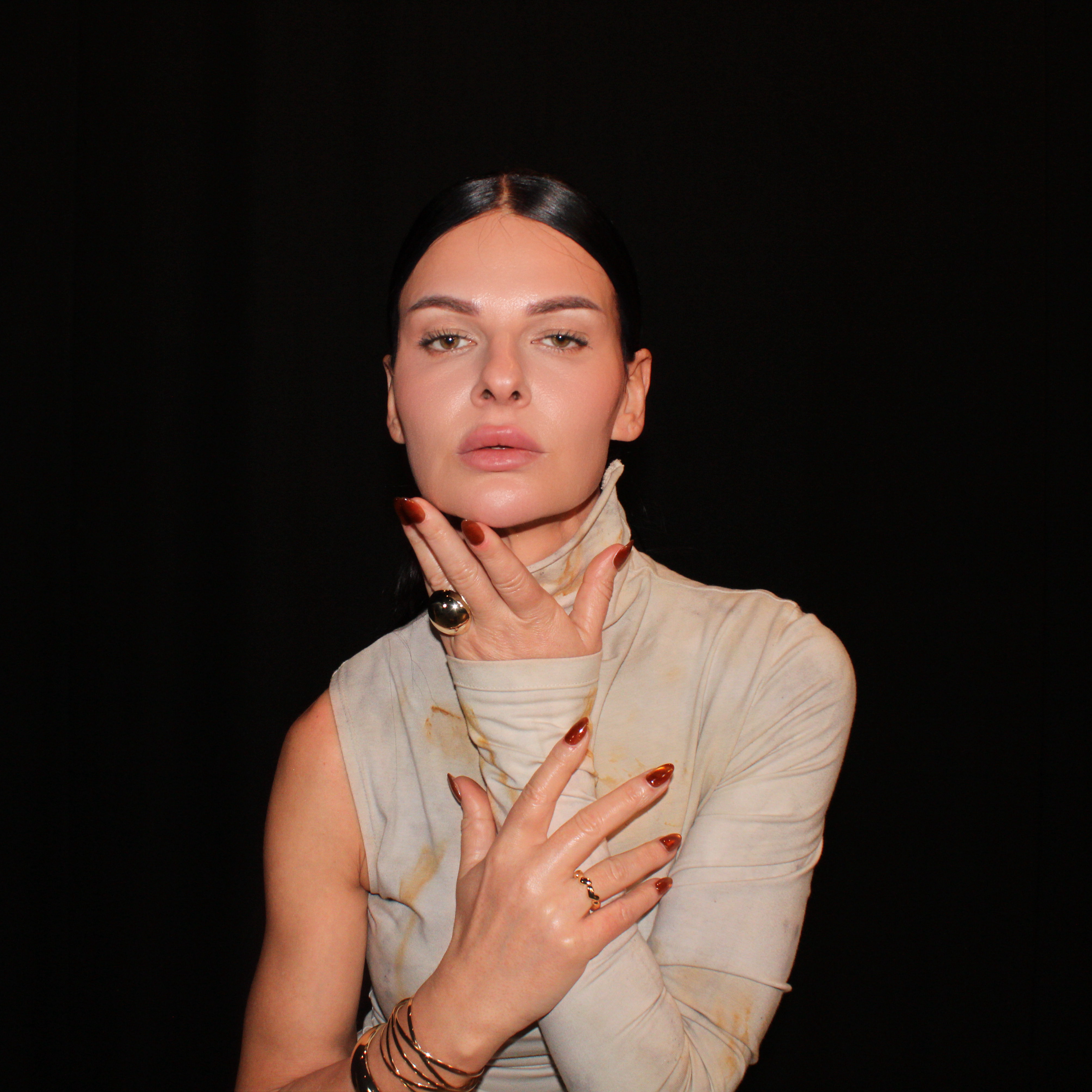 Model showcasing Editory Atelier nail art in fashion editorial