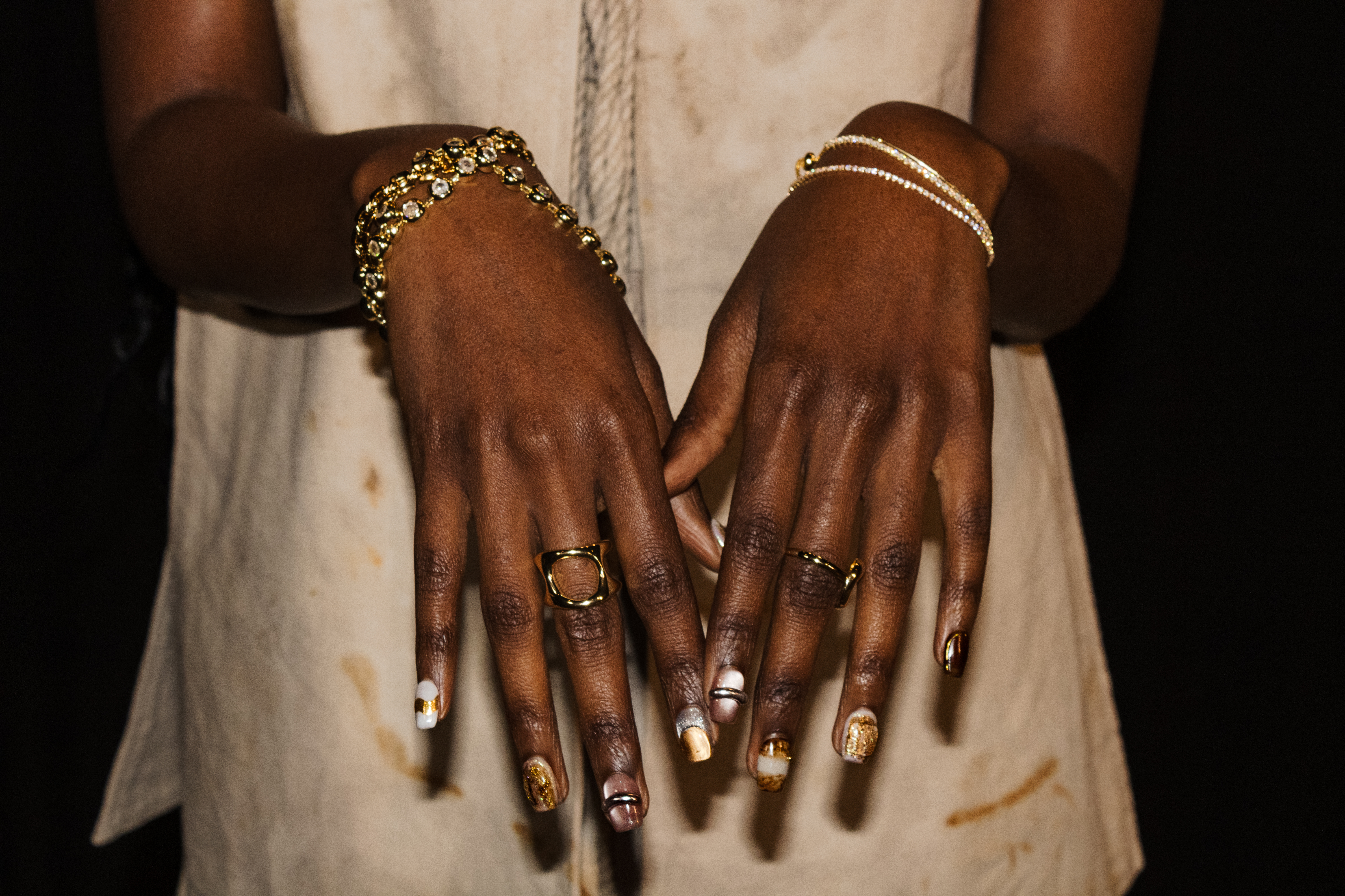 Model hands wearing Editory Atelier nail art in editorial shoot